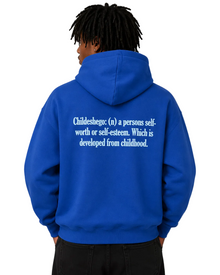 Person wearing a blue hoodie with text on the back against a gray background