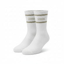 A pair of off-white crew socks with olive green stripes and a stitched 'Cottonwood' brand patch on the cuffs, displayed against a plain white background.