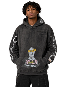 Person wearing a dark gray hoodie with various designs and text on a white background